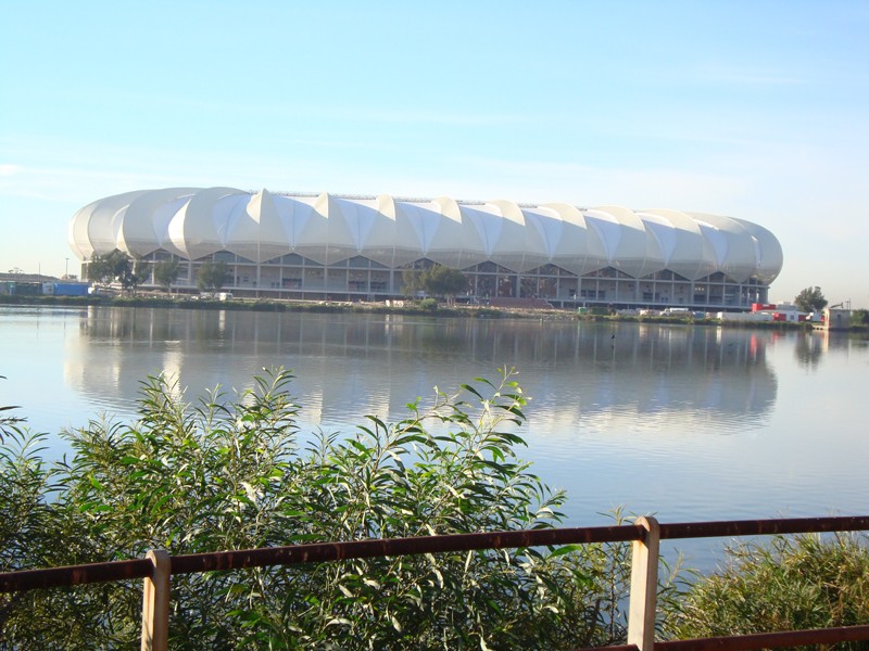 Nelson Mandela Bay Stadium reflected in North End Lake